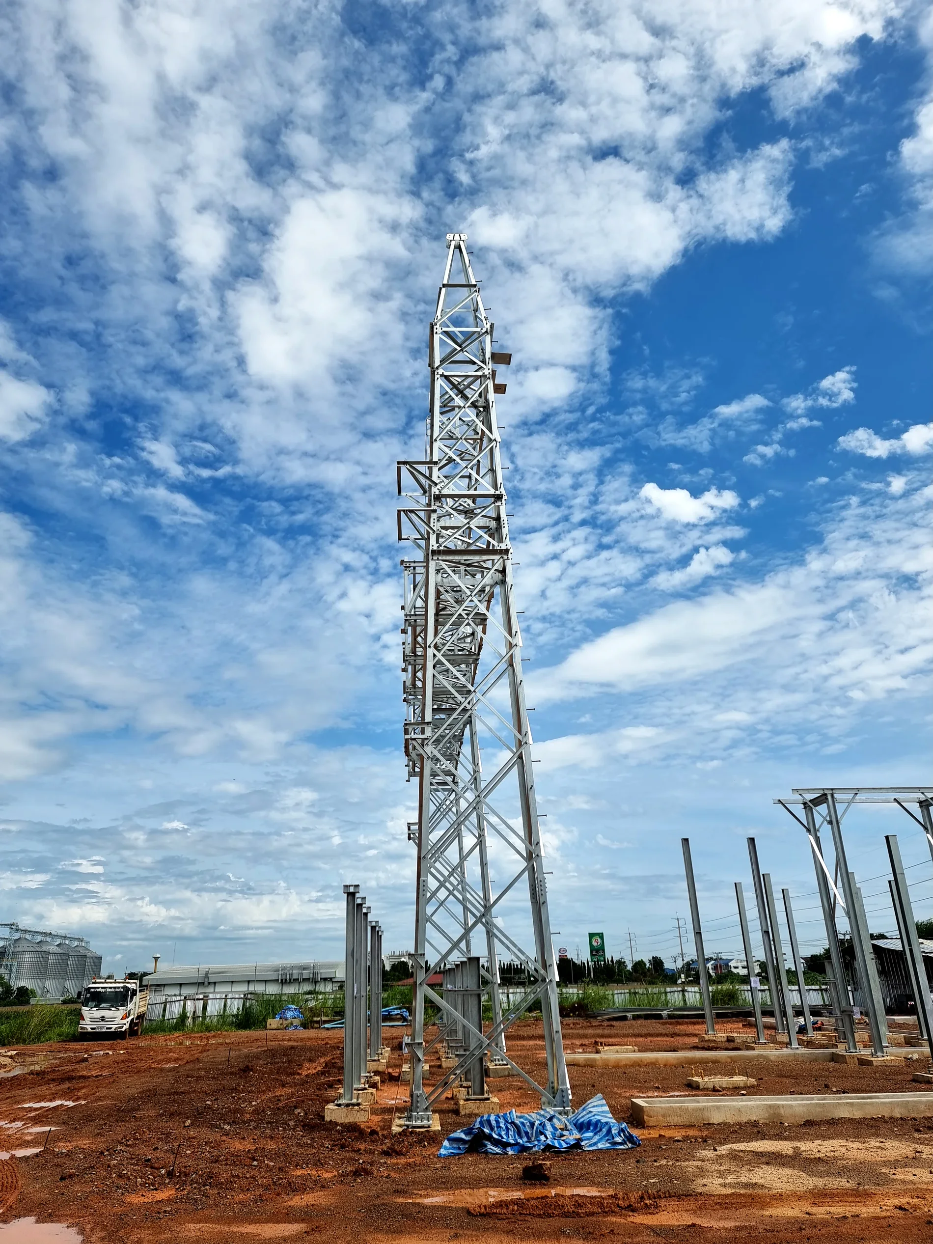 High-voltage tower under construction at a substation